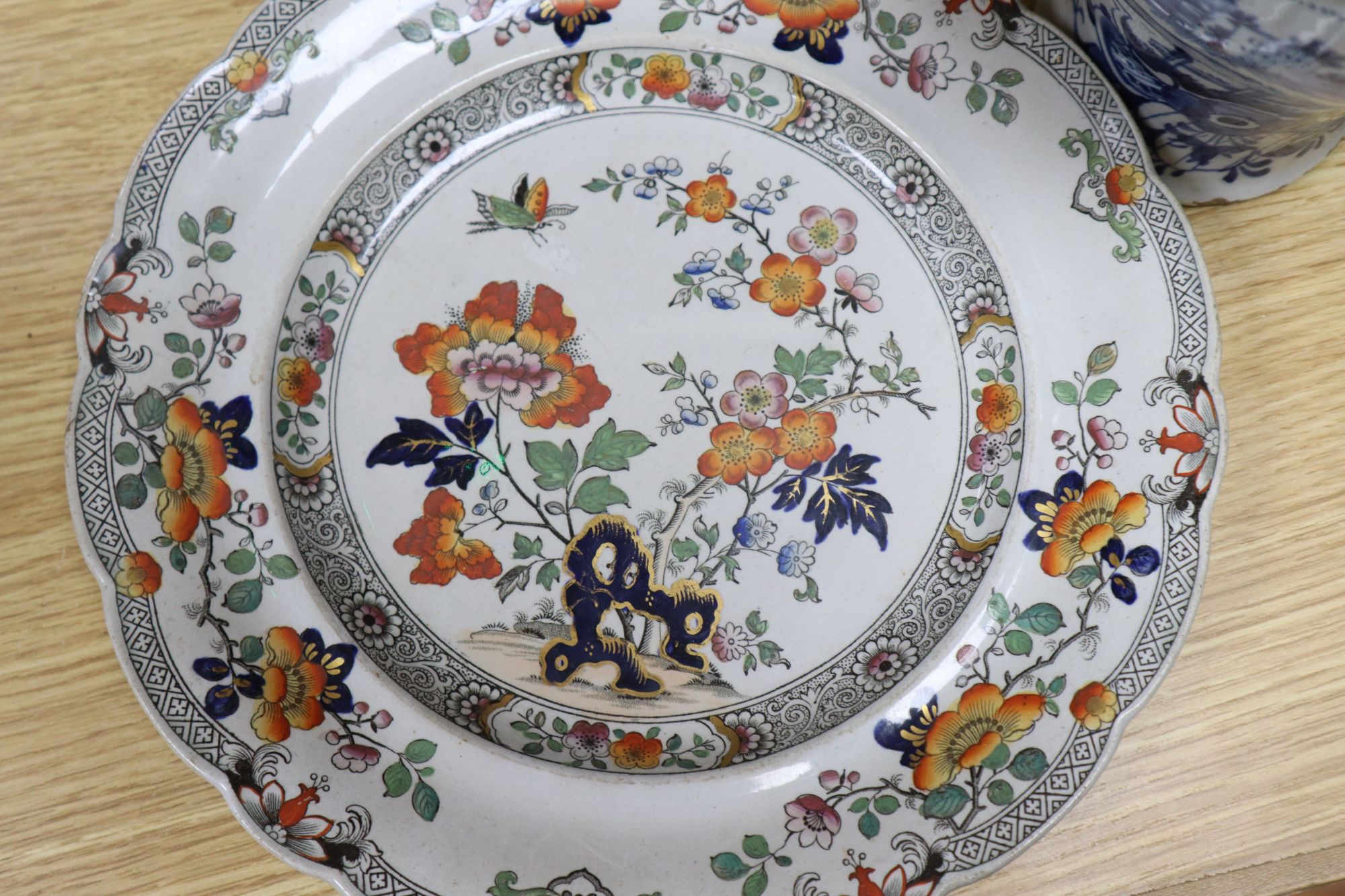 Three blue and white meat platters, largest 49cm wide, two ironstone plates and a tureen and a Delft vase